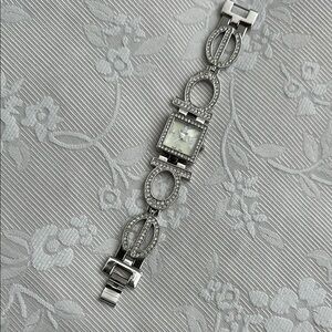 Elegant Silver Watch with Crystal Accents